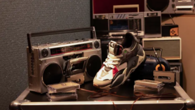 image of PUMA x Roc Nation sneakers near a record player